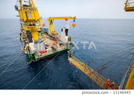 Large crane vessel installing the platform in offshore 13146945