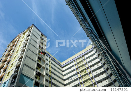 A block of HDB Flats found in Singapore against blue sky 13147291