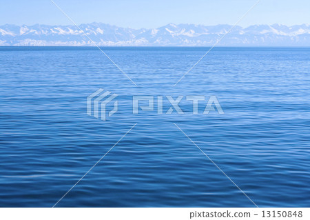 Blue mountains and lake view, Kyrgyzstan,  Issyk-Kul lake. 13150848