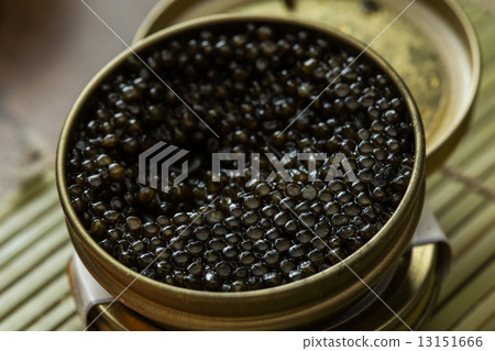 Black caviar in small round metal tin Black caviar in small round metal tin 13151666