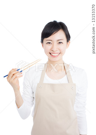 A woman with chopsticks 13153370