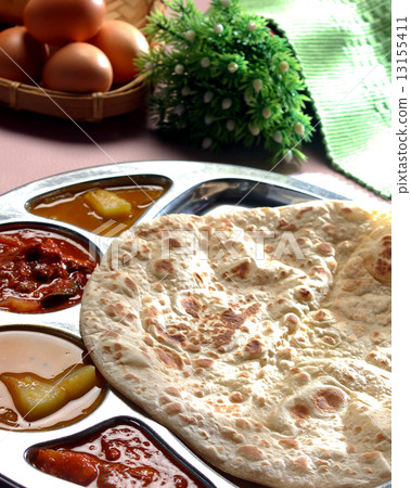 Roti canai, roti tisu, south indian fried bread 13155411