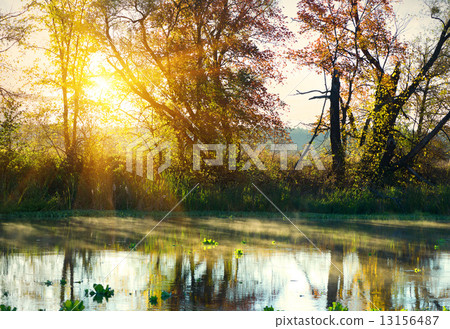 Bright sunrise over river Bright sunrise over river 13156487
