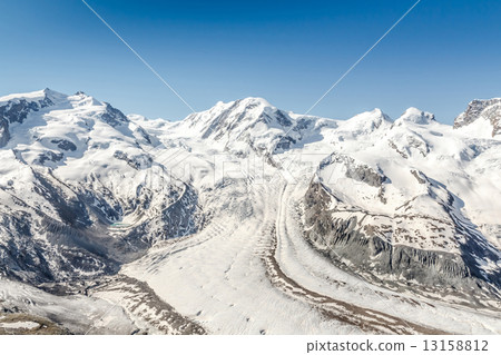 Snow Mountain Range Landscape at Alps Region, Switzerland 13158812