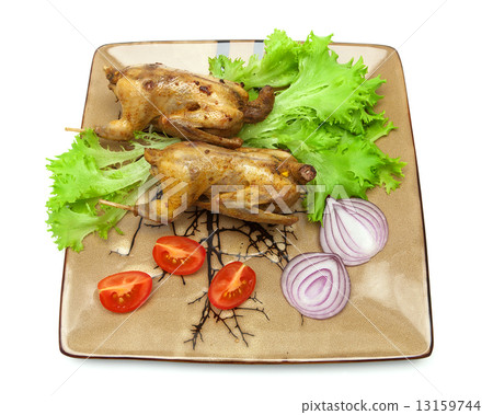 woodcocks fried with vegetables on a plate. white background. 13159744