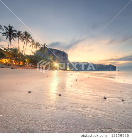 beautiful beach with colorful sky, Thailand 13159926