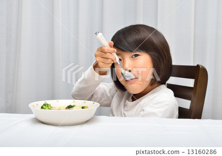 A girl who eats a cream stew deliciously A girl who eats a cream stew deliciously 13160286