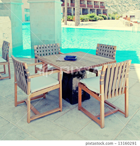 Summer hotel terrace with pool and outdoor furniture(Greece) Summer hotel terrace with pool and outdoor furniture(Greece) 13160291