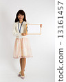 A woman with a board (whole body) 13161457
