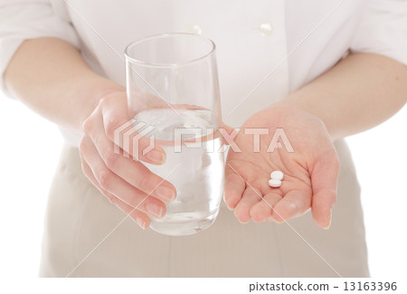 Woman taking medicine 13163396