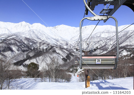 Ski lifts and snow mountains 13164203