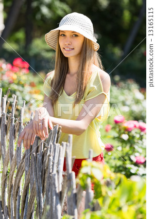girl near fence 13165115