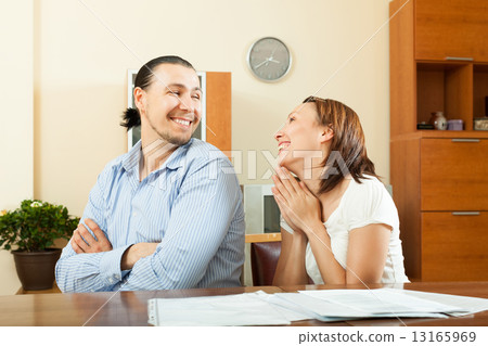 Woman asking for money from husband 13165969
