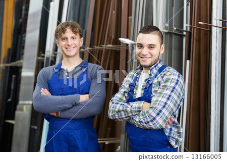 Two positive workers posing in PVC shop Two positive workers posing in PVC shop 13166005