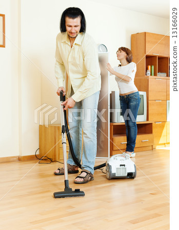 couple are doing house cleaning couple are doing house cleaning 13166029