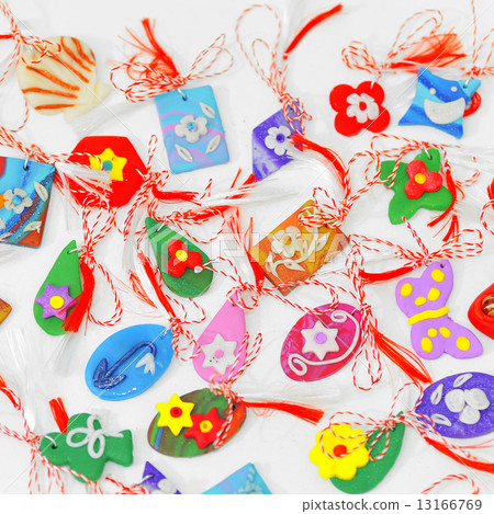 female ornaments from polymeric hand-worked clay 13166769