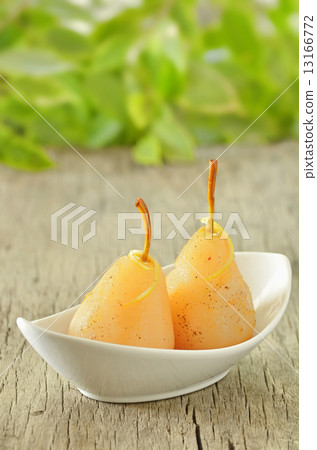 two pears poached in syrup two pears poached in syrup 13166772