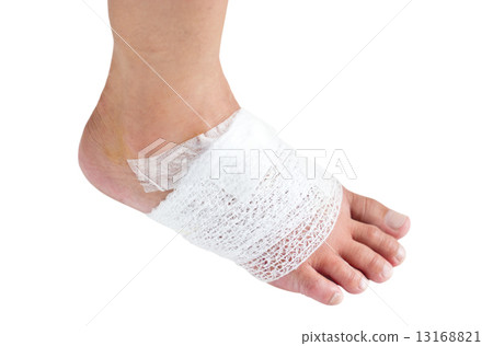 Injured ankle with bandage. 13168821