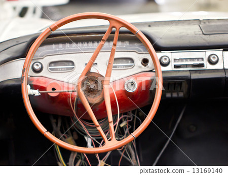 Damaged vintage steering wheel car. Damaged vintage steering wheel car. 13169140