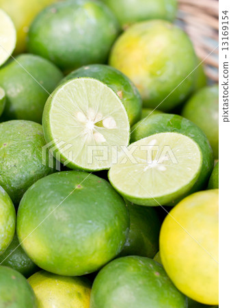 Pile of green lemon. Pile of green lemon. 13169154