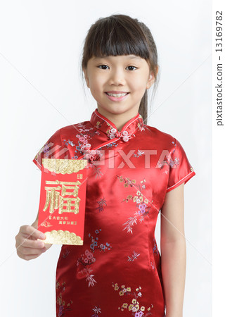One young chinese girl in cheongsam holding a red packet in isolated white background One young chinese girl in cheongsam holding a red packet in isolated white background 13169782