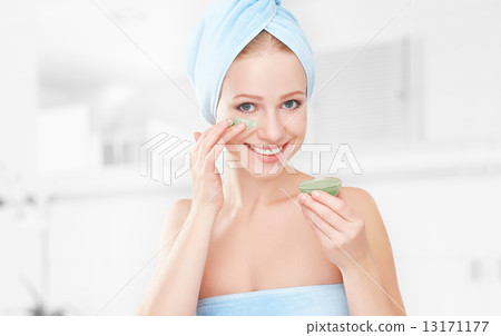beautiful girl in  bathroom and mask for facial skin care 13171177
