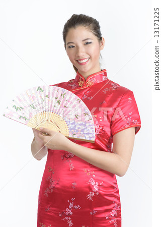 One young chinese woman in Cheongsam with Chinese Fan in isolated white background 13171225