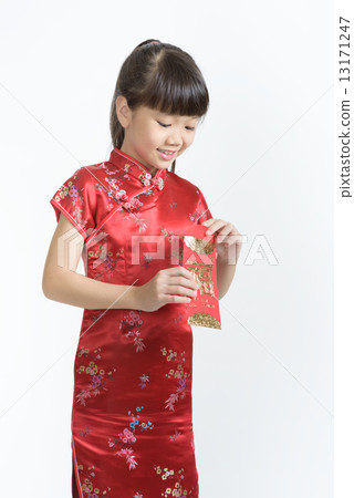 1 young chinese girl in cheongsam opening her lunar new year red packet isolated white background 1 young chinese girl in cheongsam opening her lunar new year red packet isolated white background 13171247