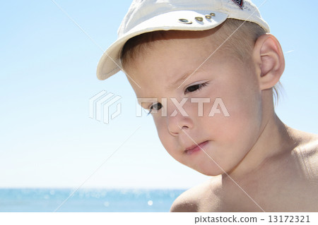 portarit of boy on summer sea beach 13172321