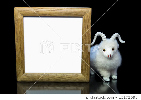 Goat or sheep with blank wood frame Goat or sheep with blank wood frame 13172595