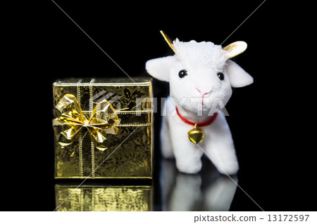 Goat or sheep with gift box 13172597