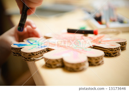 Little female baby painting with colorful paints 13173646