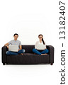 Asian Couple on Couch in White Background 13182407