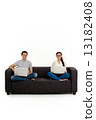 Asian Couple on Couch in White Background 13182408