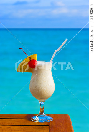 Milk cocktail on table at beach cafe 13190866