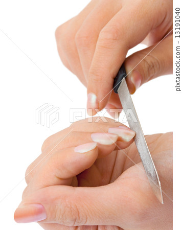 Hands and manicure nail file 13191040