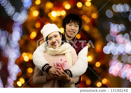 Lovers who are hugging in the place where illumination is beautiful 13198248