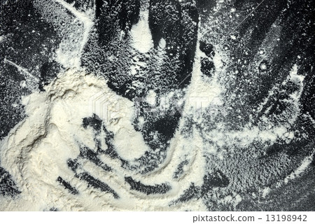 White flour on black background White flour on black background 13198942