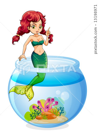 A mermaid inside the aquarium A mermaid inside the aquarium 13198971