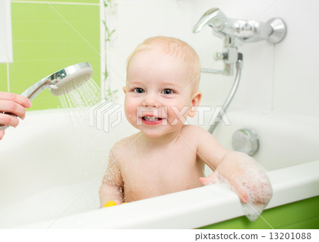 toddler boy taking a bath toddler boy taking a bath 13201088