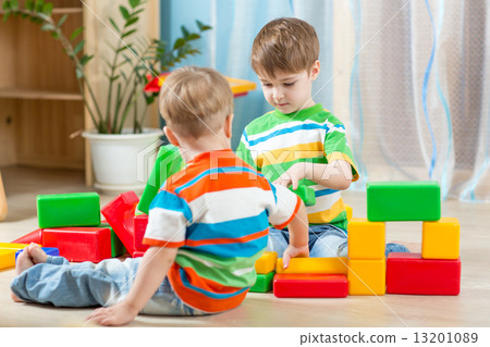 Kids playing in the room Kids playing in the room 13201089