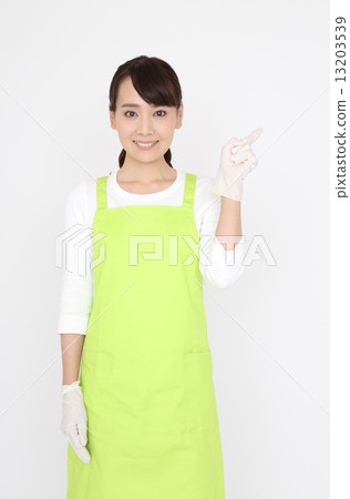 A woman with an apron 13203539