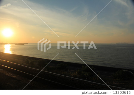 Sunset seen from Shimonada Station, Iyo City, Ehime Prefecture Sunset seen from Shimonada Station, Iyo City, Ehime Prefecture 13203615