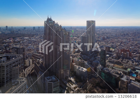 Shinjuku Park Tower and the Opera City are exposed to the sunlight from Tokyo Metropolitan Government Office 13206618