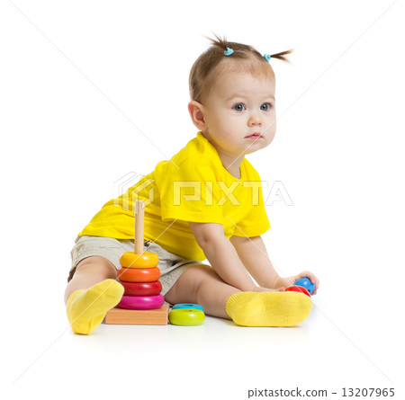 baby girl playing with colorful pyramid isolated baby girl playing with colorful pyramid isolated 13207965