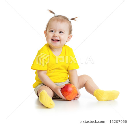Baby eating apple sitting isolated 13207966