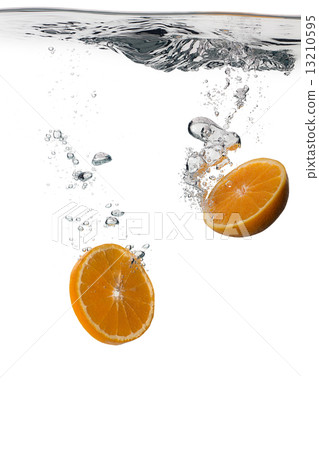 Healthy Orange slices with water splashes isolated on white Healthy Orange slices with water splashes isolated on white 13210595
