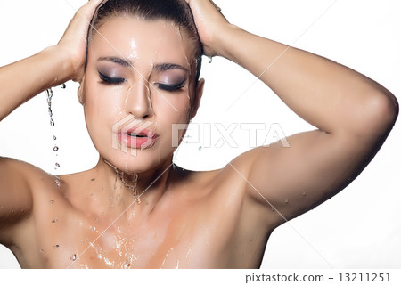 Young Beauty Woman with Wet Makeup. Beauty and Fashion under Flowing Water 13211251