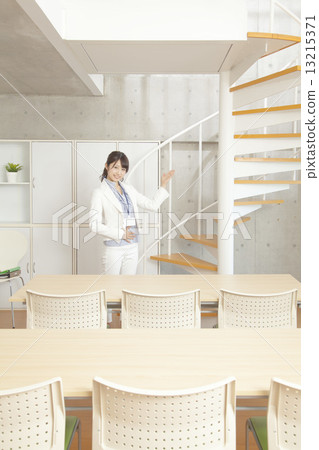 Female lecturer at seminar room 13215371