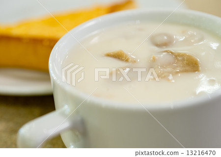 Creamy hot basil musroom soup served with chicken cutlet Creamy hot basil musroom soup served with chicken cutlet 13216470